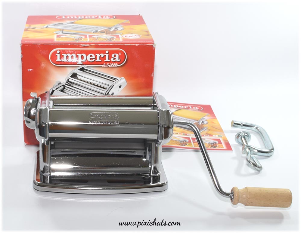 Replace the scraper blades on an Imperia pasta making machine